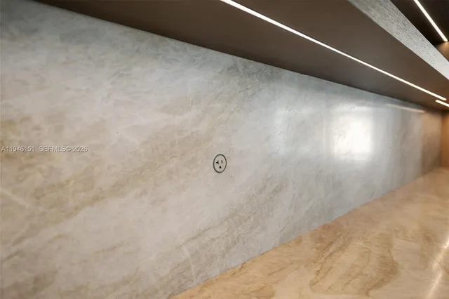 a view of a kitchen with a sink and a large window