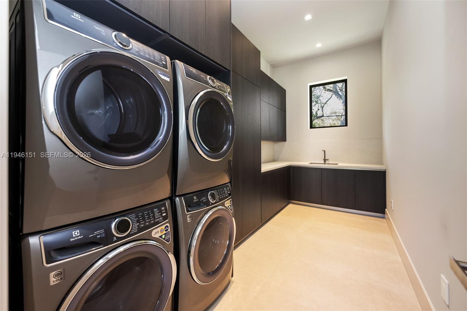 7725 Southwest 114th Street Pinecrest, FL 33156 - Photo 94 of 94 2 Electrolux Washers, 2 Electrolux Dryers