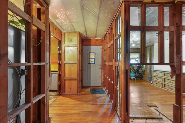a bathroom with a tub and shower