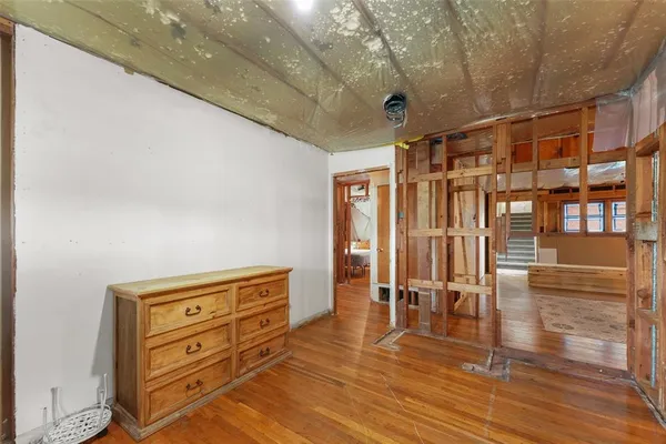 a kitchen with a refrigerator and a sink