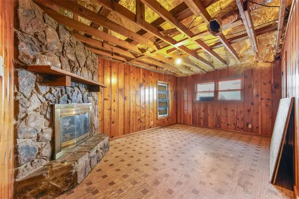 a bathroom with a sink a mirror and a shower