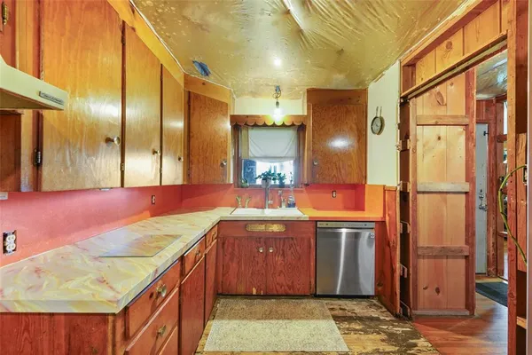 a bathroom with a tub and shower