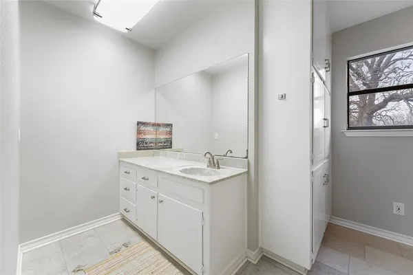 a kitchen with a sink and a window