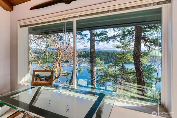 a view of a room with a large window