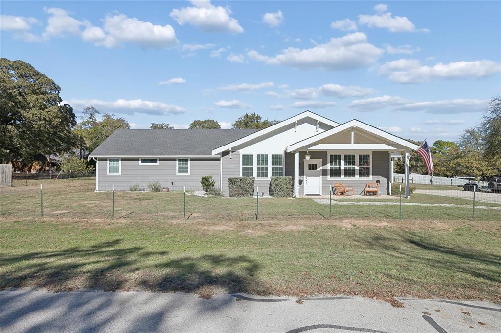 7232 Courtney Drive Azle, TX 76020 - Photo 1 of 39 a front view of a house with a yard