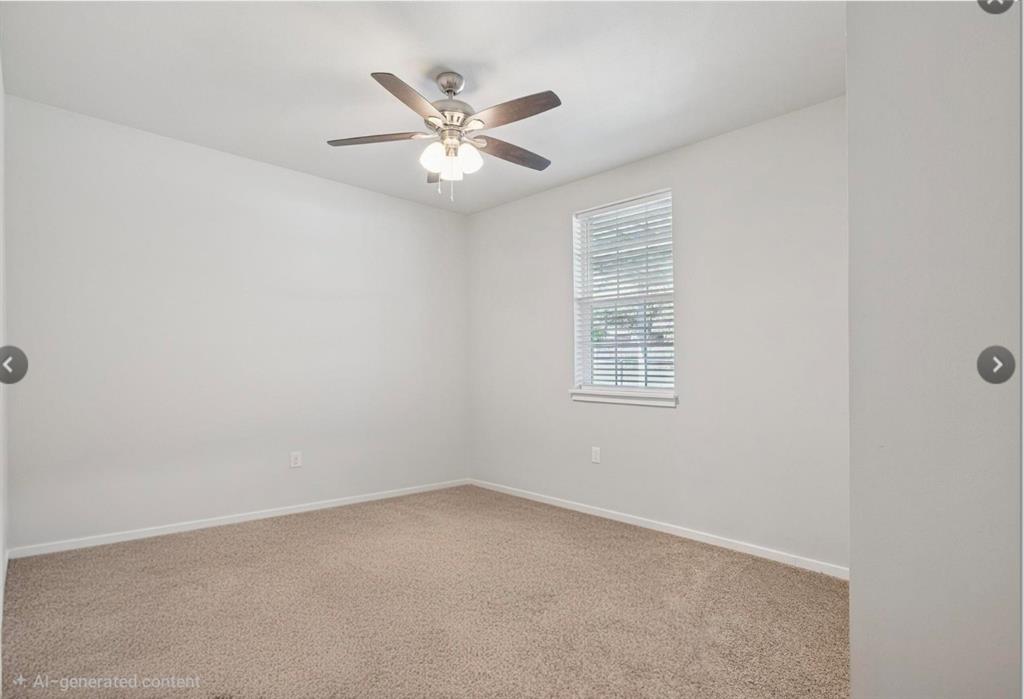 7232 Courtney Drive Azle, TX 76020 - Photo 32 of 39 an empty room with windows and fan
