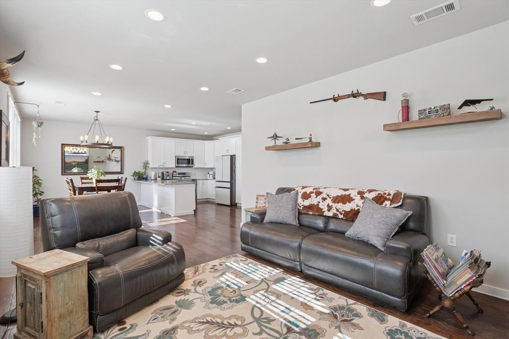 7232 Courtney Drive Azle, TX 76020 - Photo 10 of 39 a living room with furniture and kitchen view