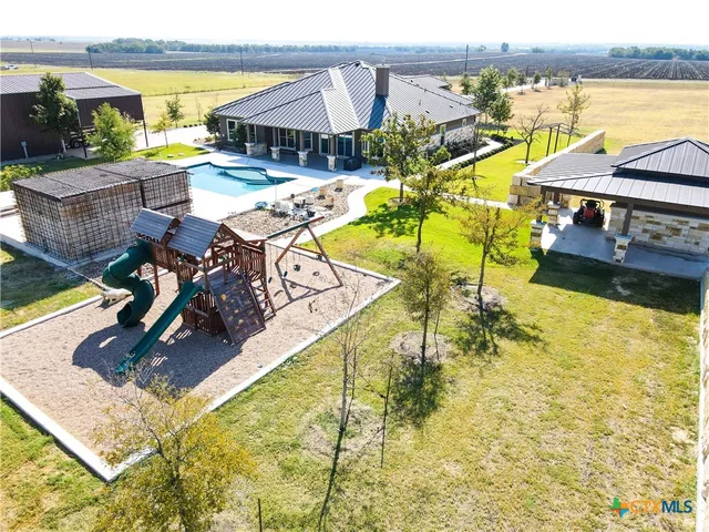 a view of a swimming pool with an ocean view