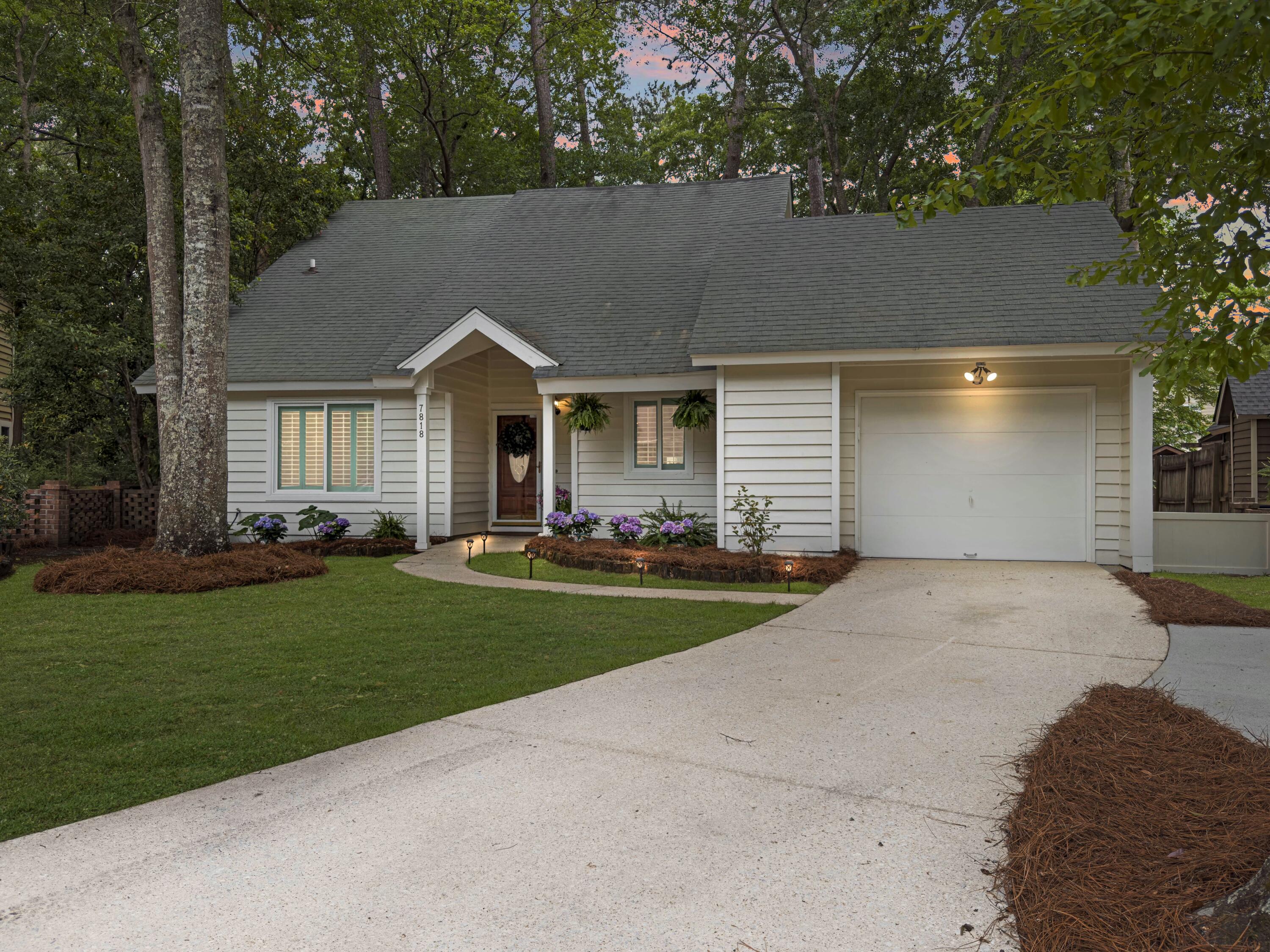 7818 Racquet Road North Charleston, SC 29418 - Photo 34 of 50 TWILIGHT FRONT OF HOUSE