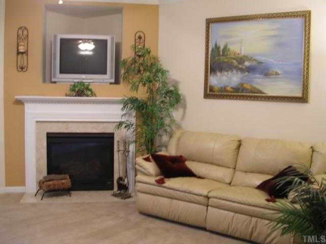 3057 Settle In Lane Raleigh, NC 27614 - Photo 5 of 11 Living with corner gas fireplace
