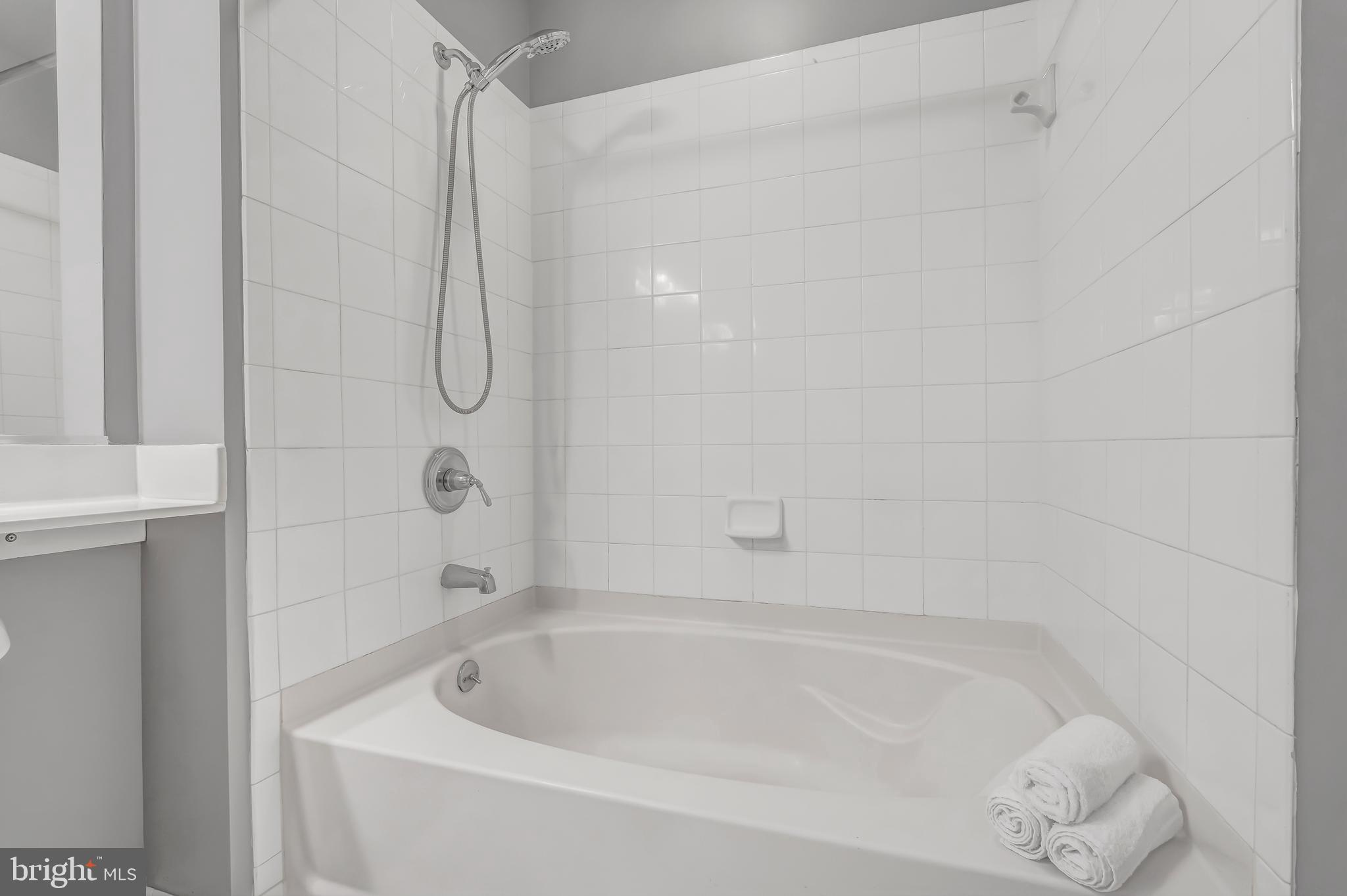 11700 Old Georgetown Road, Unit 1314 North Bethesda, MD 20852 - Photo 29 of 29 a bathroom with a bathtub