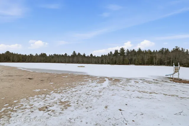 a view of a lake with a city