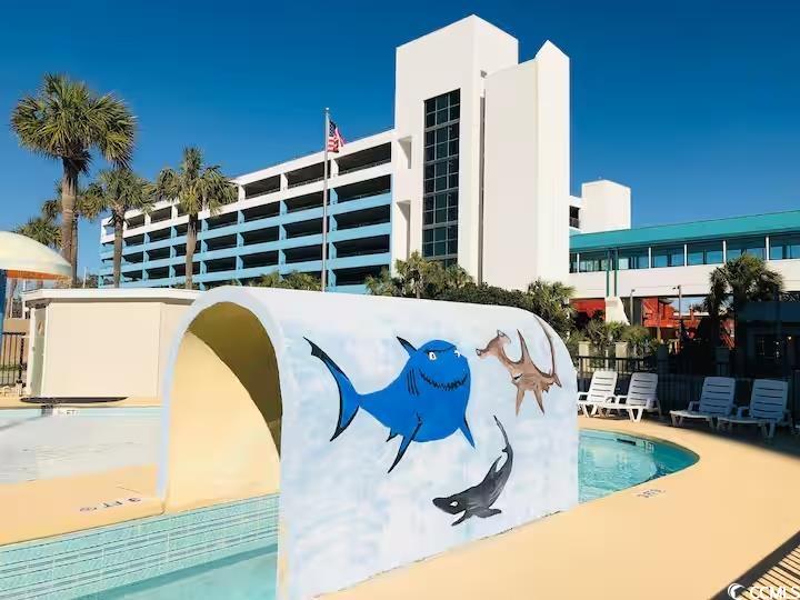 1600 South Ocean Boulevard, Unit 322 Myrtle Beach, SC 29577 - Photo 6 of 16 View of swimming pool featuring a patio