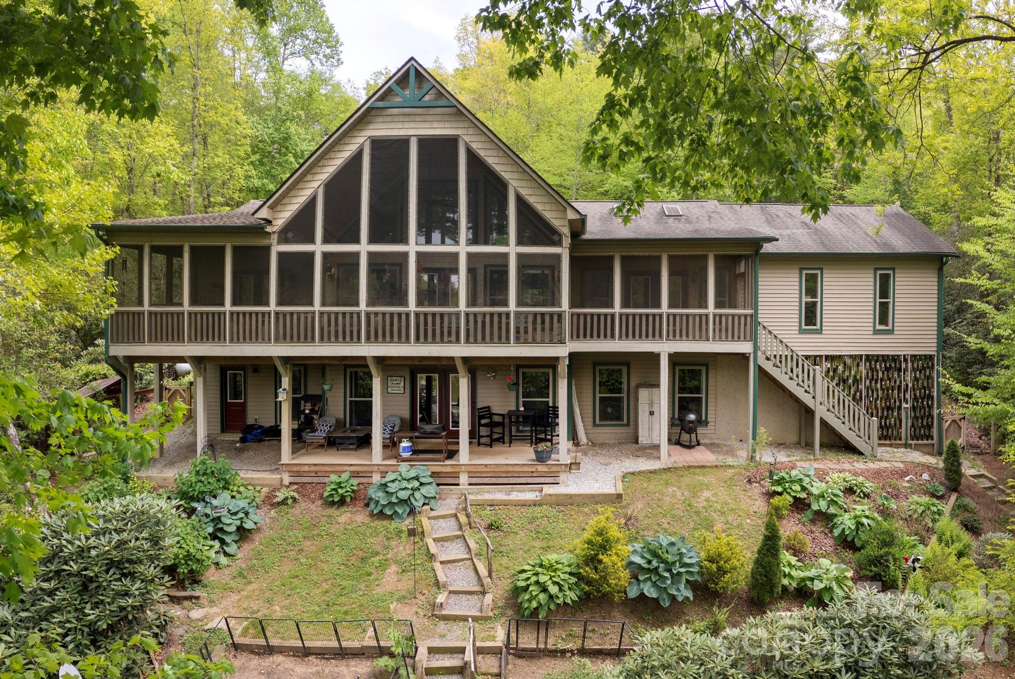 149 Hiwassee Road Lake Toxaway, NC 28747 - Photo 1 of 48 a view of house with front of house
