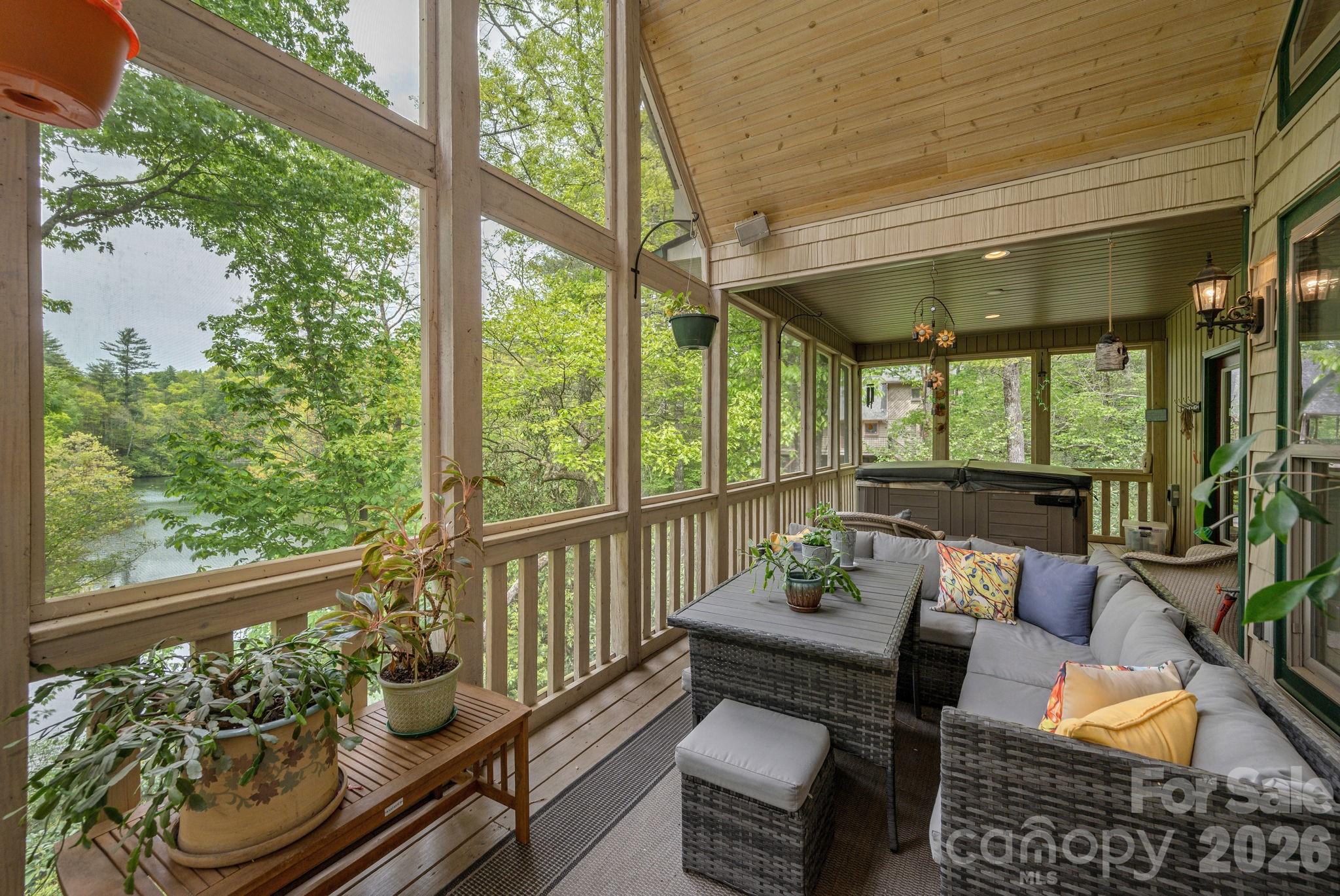 149 Hiwassee Road Lake Toxaway, NC 28747 - Photo 13 of 48 a outdoor living space with furniture and garden view