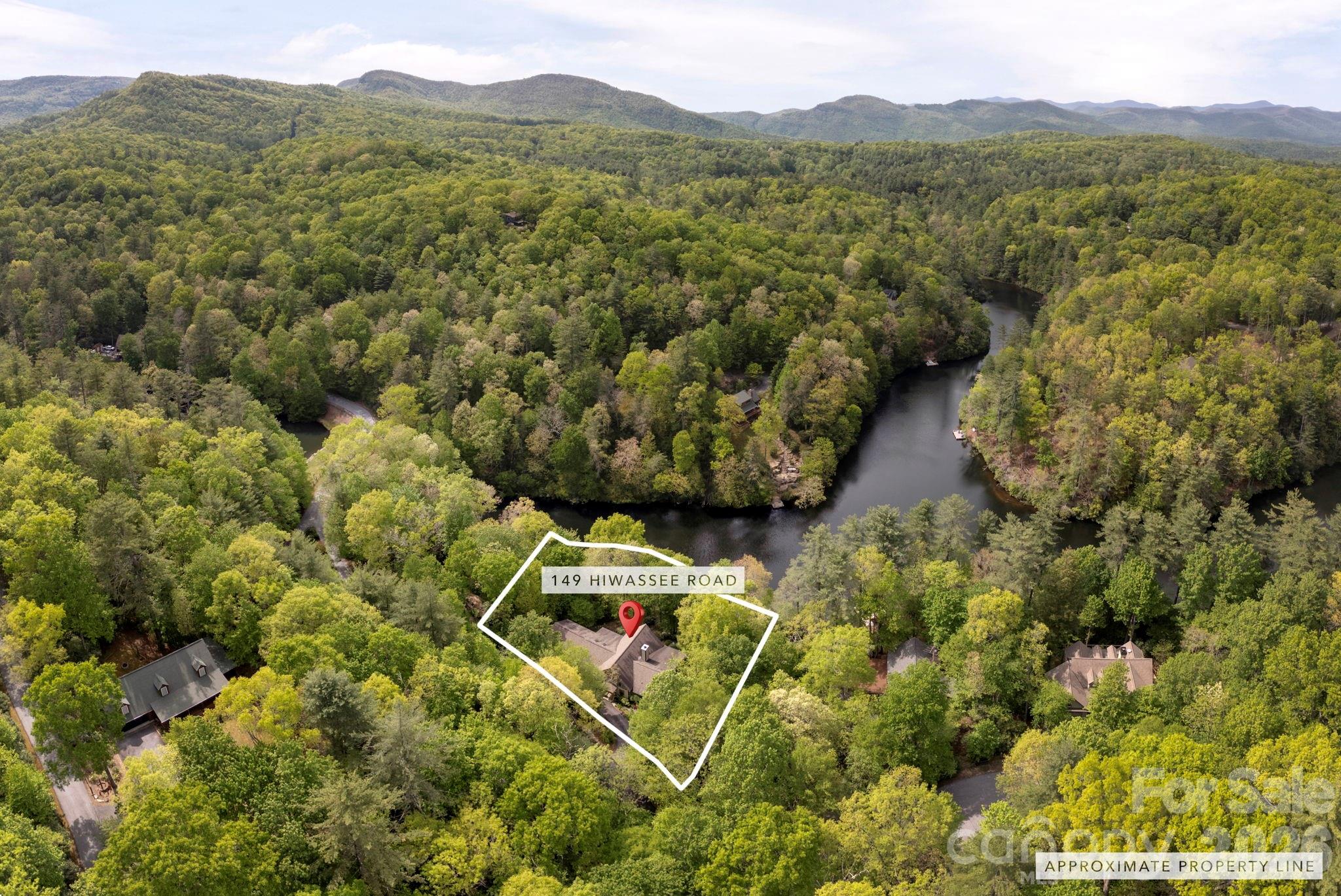 149 Hiwassee Road Lake Toxaway, NC 28747 - Photo 45 of 48 a view of a forest with a mountain