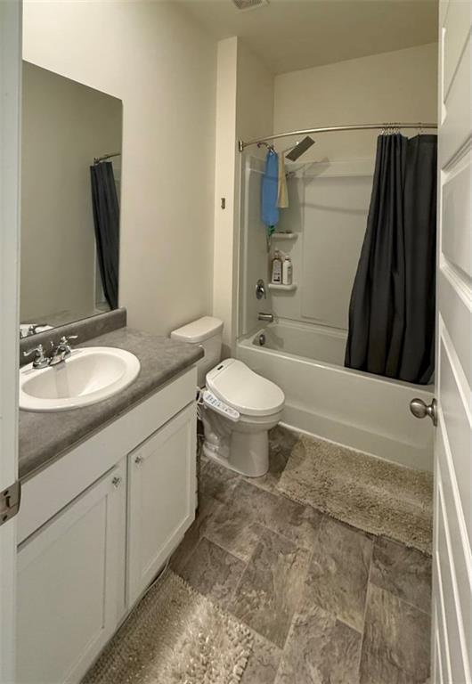 2015 Waycross Lane Dacula, GA 30019 - Photo 11 of 49 a bathroom with a double vanity sink toilet and shower