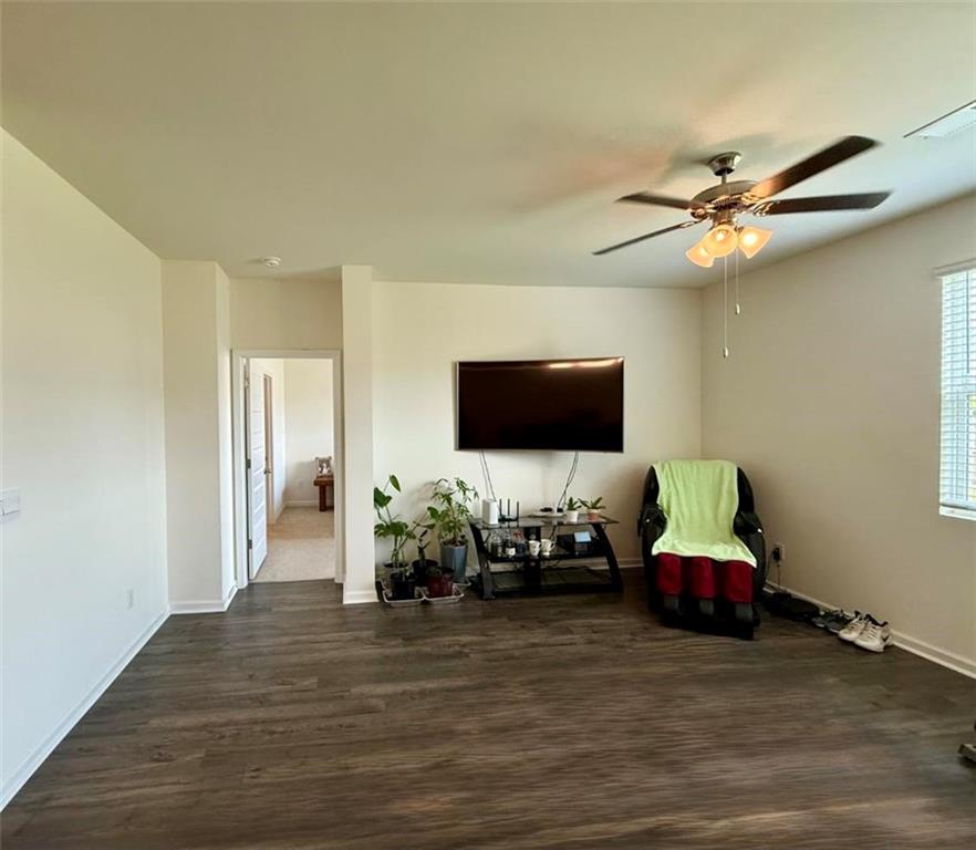 2015 Waycross Lane Dacula, GA 30019 - Photo 25 of 49 a room with furniture and a flat screen tv