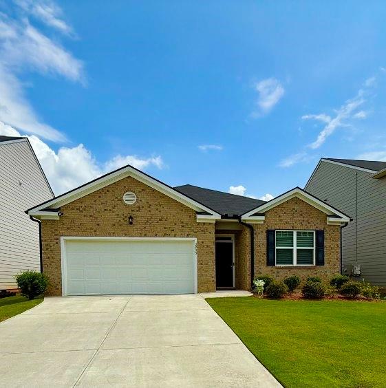 2015 Waycross Lane Dacula, GA 30019 - Photo 3 of 49 front view of a house with a yard