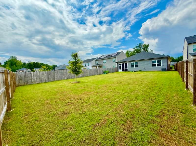 2015 Waycross Lane Dacula, GA 30019 - Photo 41 of 49 a view of a patio with a yard