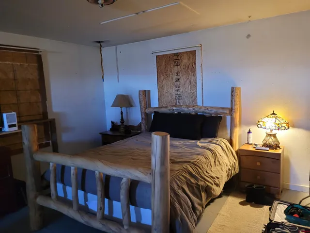 a view of a workspace with furniture