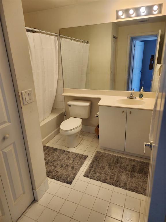 5880 West Sample Road, Unit 206 Coral Springs, FL 33067 - Photo 19 of 34 a bathroom with a sink toilet and shower