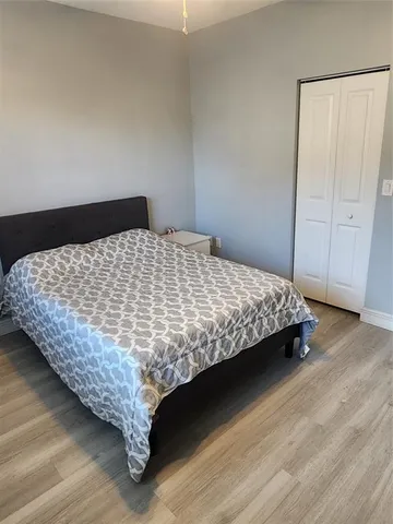 a view of a building with a garden