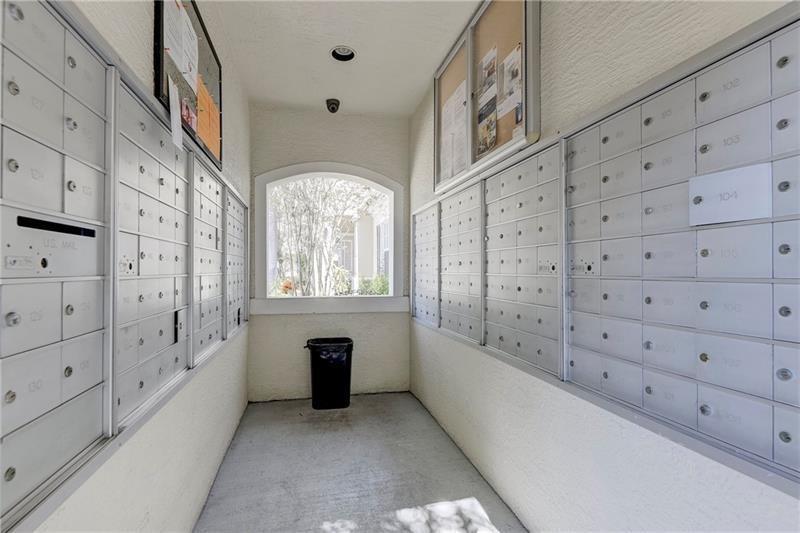 5880 West Sample Road, Unit 206 Coral Springs, FL 33067 - Photo 27 of 34 a view of an entryway with staircase