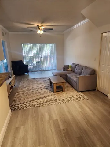 a living room with furniture and a couch