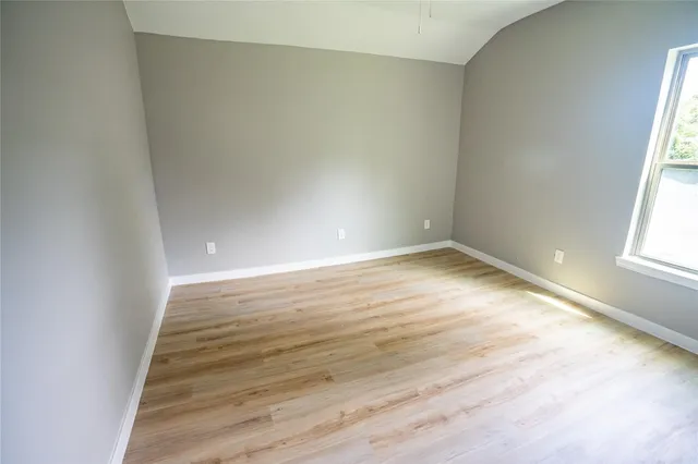 a bathroom with a sink toilet and mirror