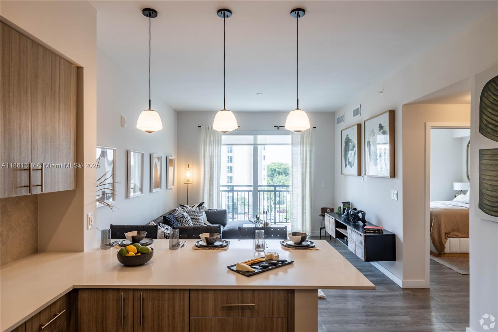 a kitchen with a sink a stove and cabinets