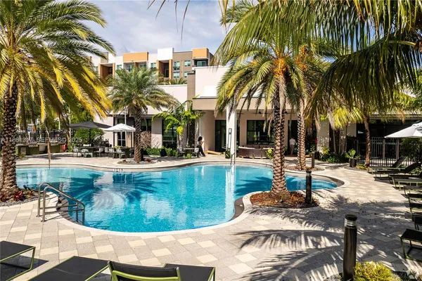 a view of outdoor space with swimming pool and patio