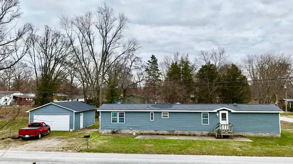 a view of a house with a garden