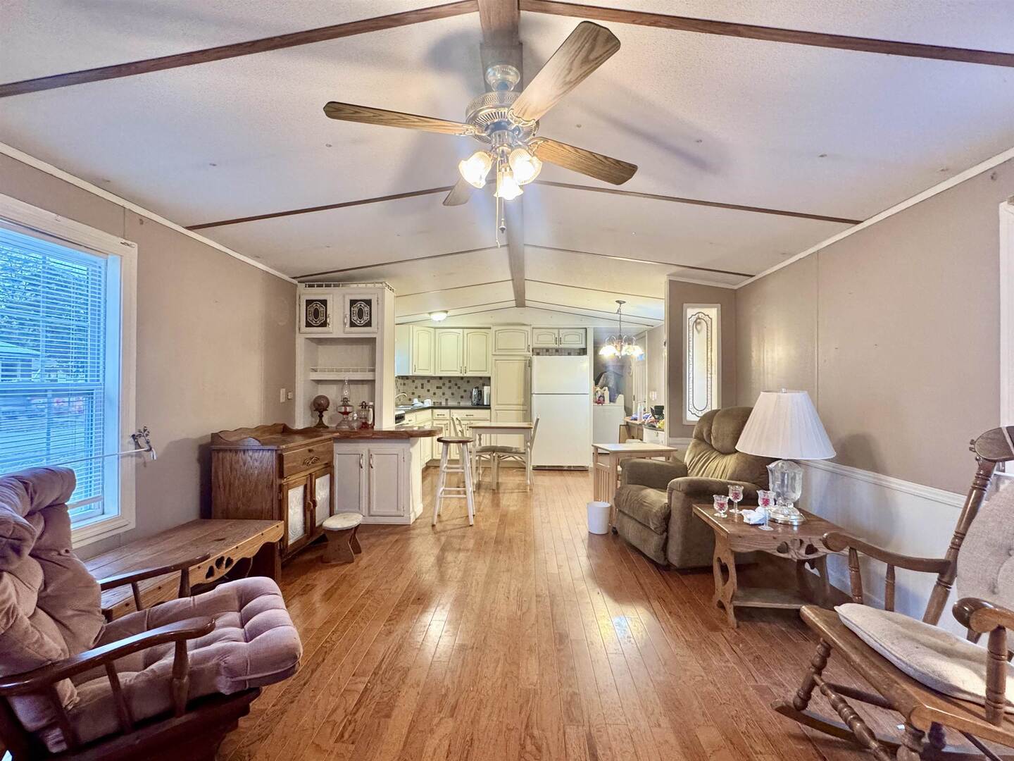 414 West Taylor Street Benton, IL 62812 - Photo 5 of 11 a living room with furniture and a large window