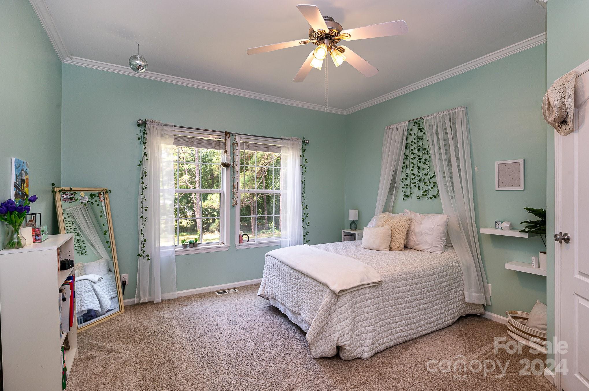 1403 Trinity Church Road Monroe, NC 28112 - Photo 14 of 28 a bedroom with a bed and a window