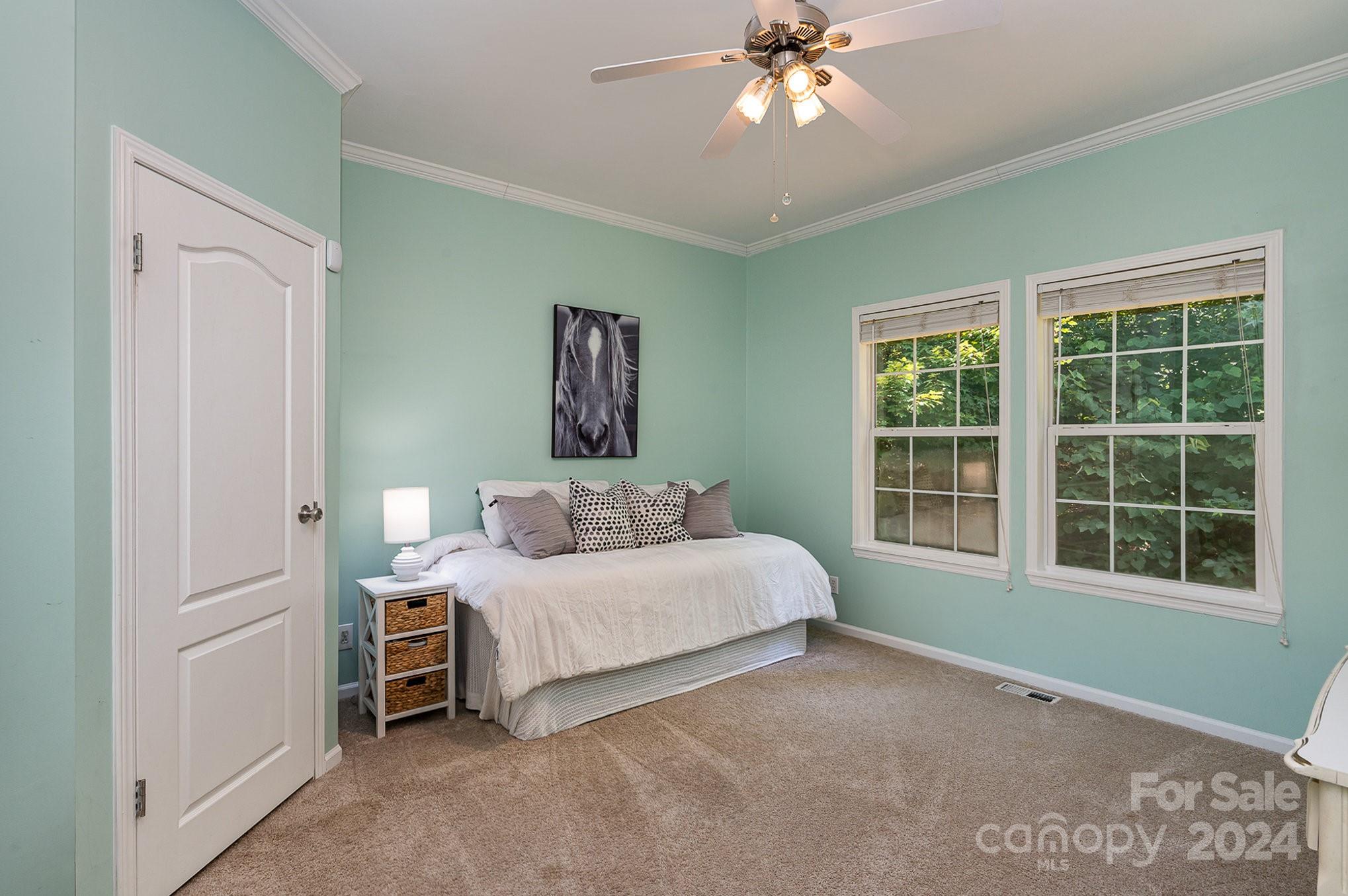 1403 Trinity Church Road Monroe, NC 28112 - Photo 15 of 28 a bedroom with a bed and a window