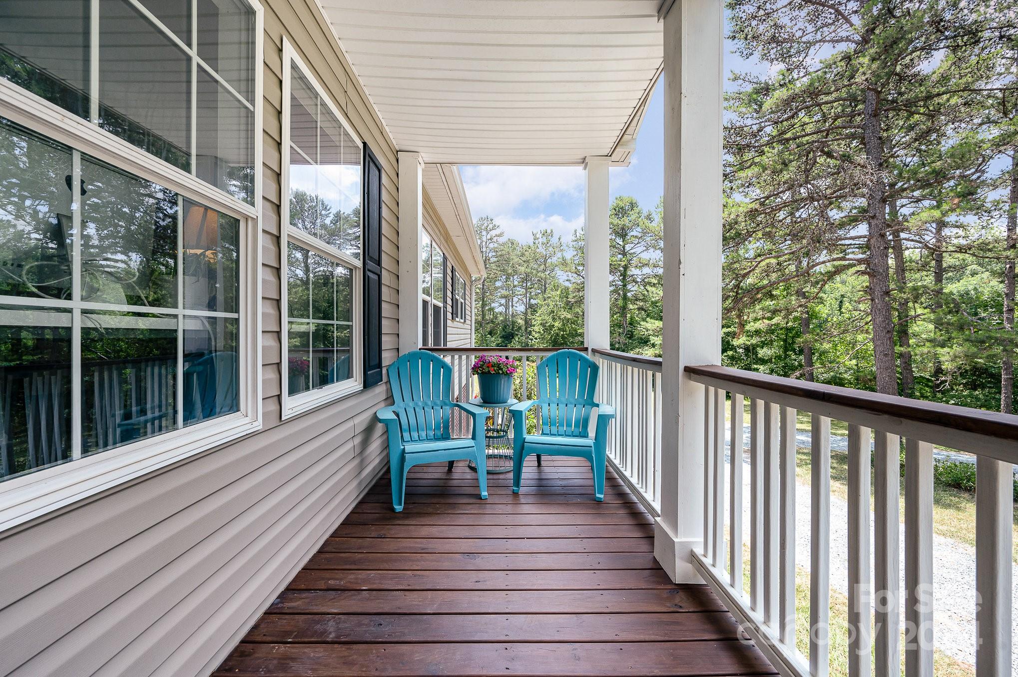 1403 Trinity Church Road Monroe, NC 28112 - Photo 5 of 28 a view of two chairs in balcony