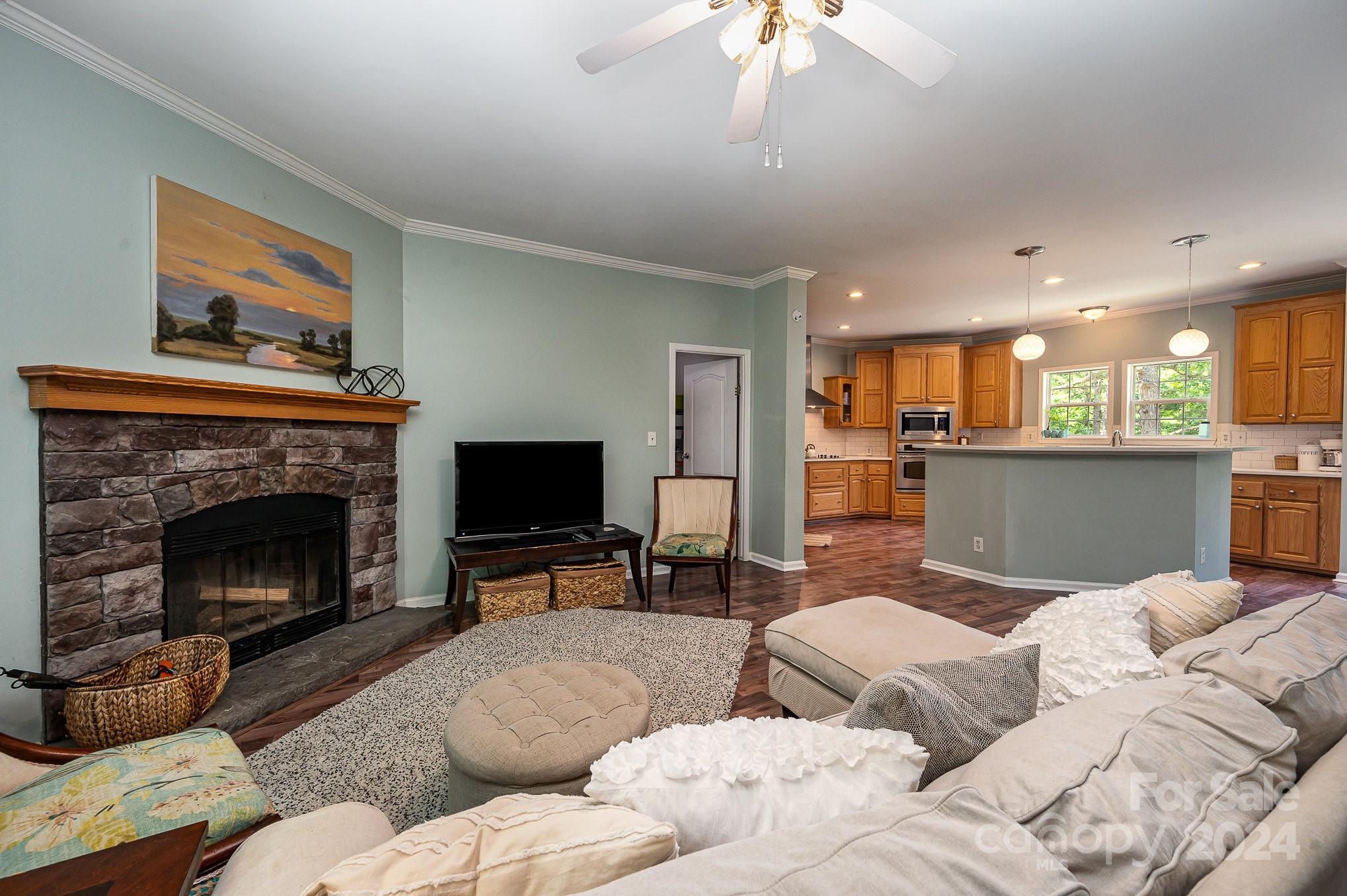 1403 Trinity Church Road Monroe, NC 28112 - Photo 7 of 28 a living room with furniture and a fireplace