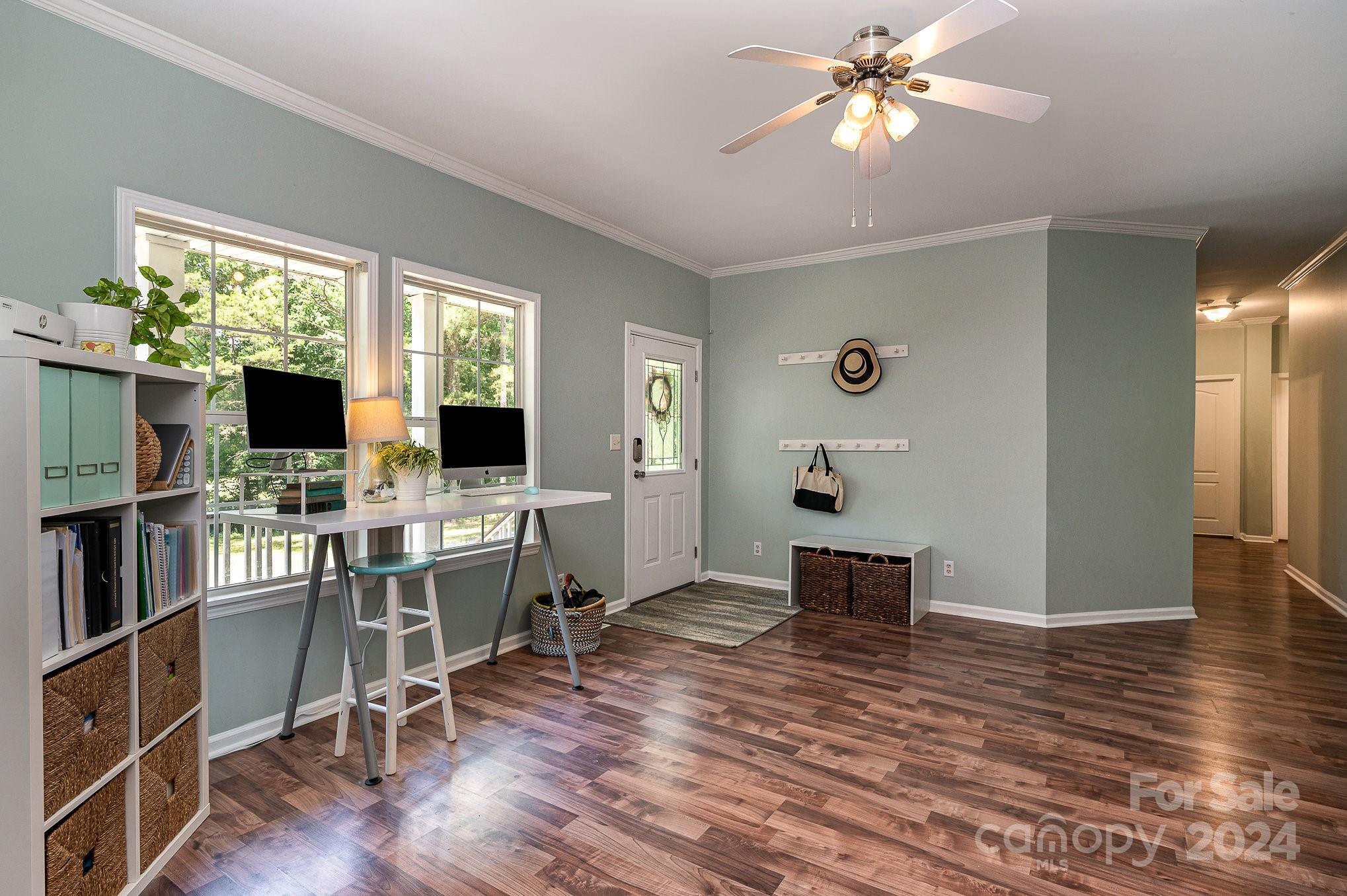 1403 Trinity Church Road Monroe, NC 28112 - Photo 10 of 28 a view of a workspace with furniture window and wooden floor