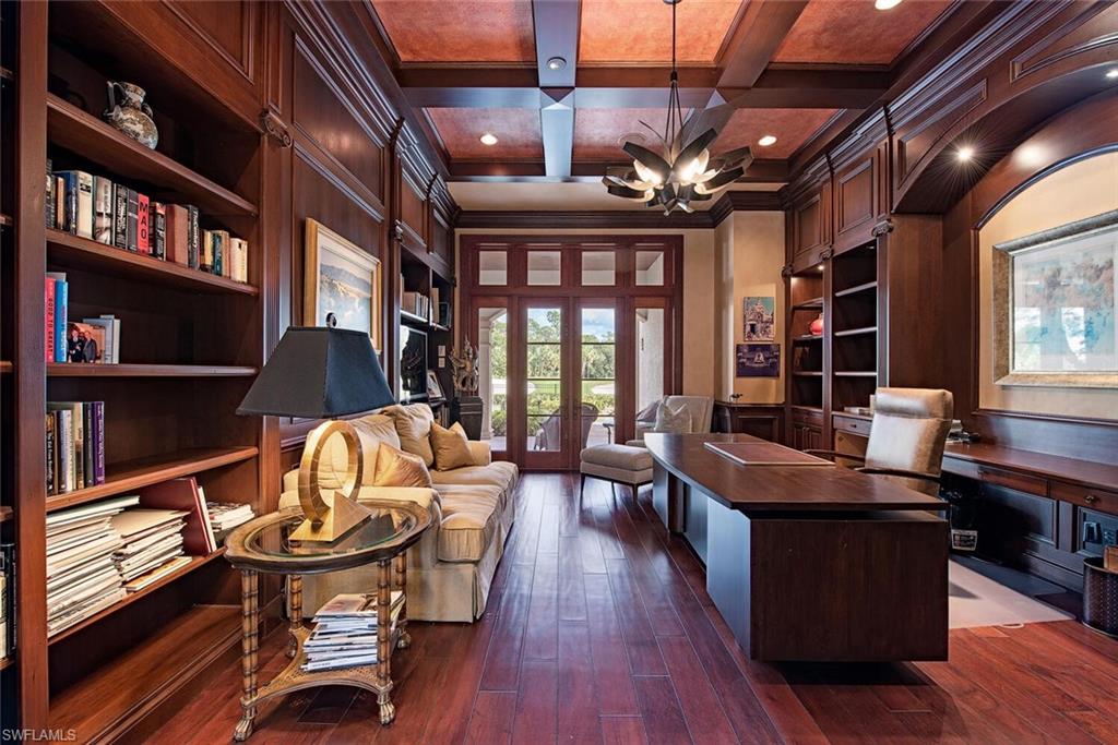 17016 Treviso Way Naples, FL 34110 - Photo 12 of 35 a view of a livingroom with furniture window and wooden floor