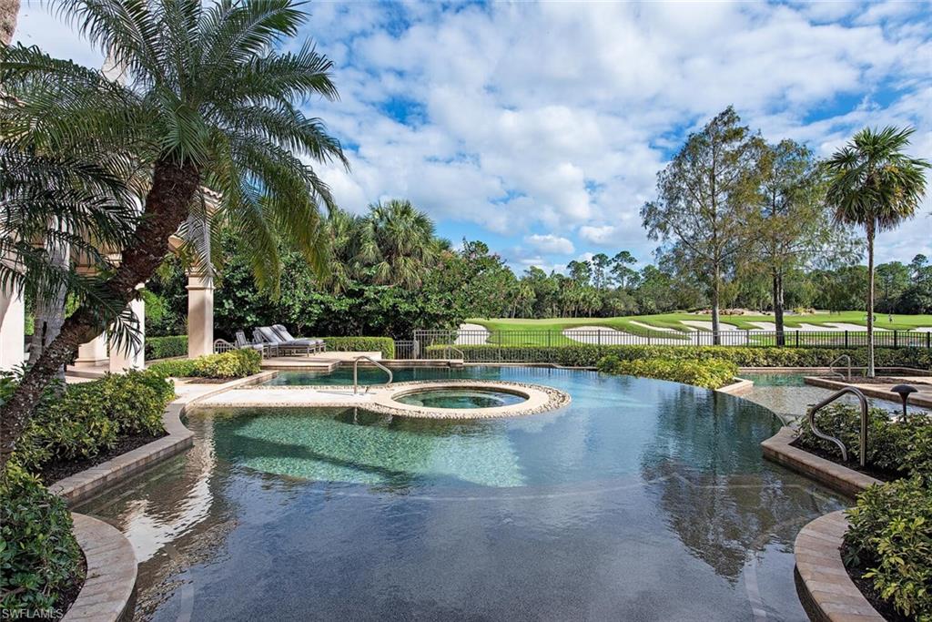 17016 Treviso Way Naples, FL 34110 - Photo 20 of 35 a view of a lake with outdoor space