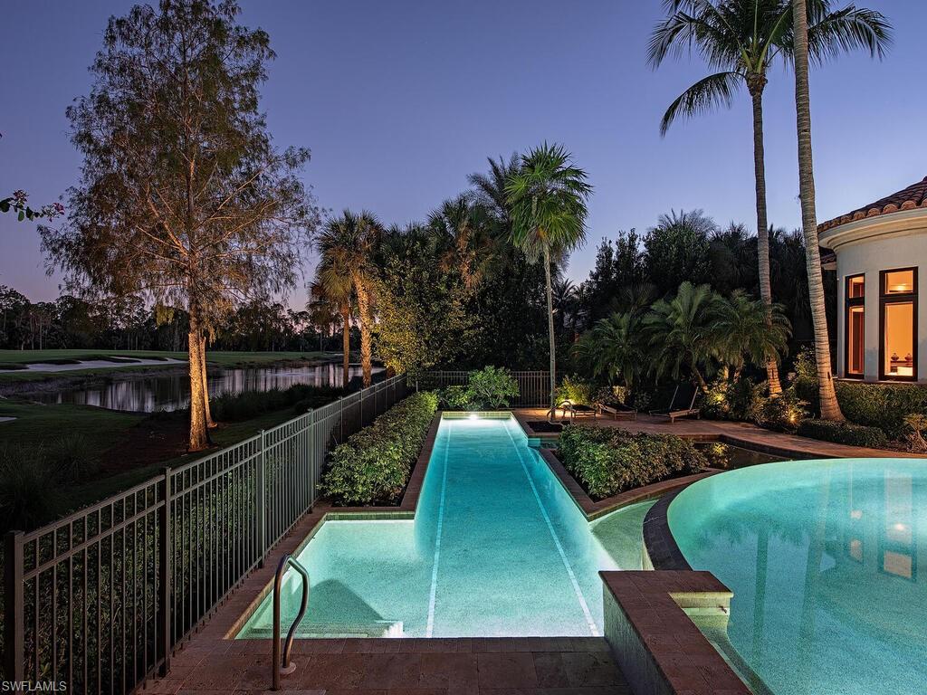 17016 Treviso Way Naples, FL 34110 - Photo 26 of 35 a view of a backyard with swimming pool