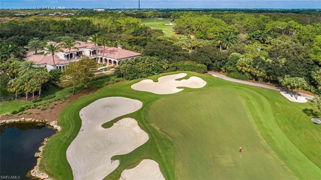 17016 Treviso Way Naples, FL 34110 - Photo 27 of 35 a aerial view of a swimming pool