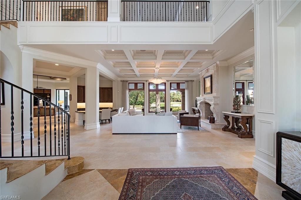 17016 Treviso Way Naples, FL 34110 - Photo 3 of 35 a living room with furniture and a potted plant