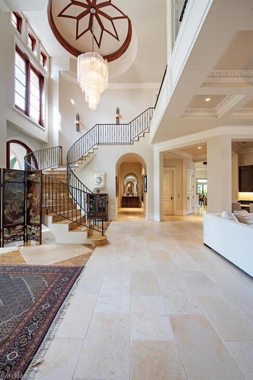 17016 Treviso Way Naples, FL 34110 - Photo 4 of 35 a view of a livingroom with a furniture and chandelier