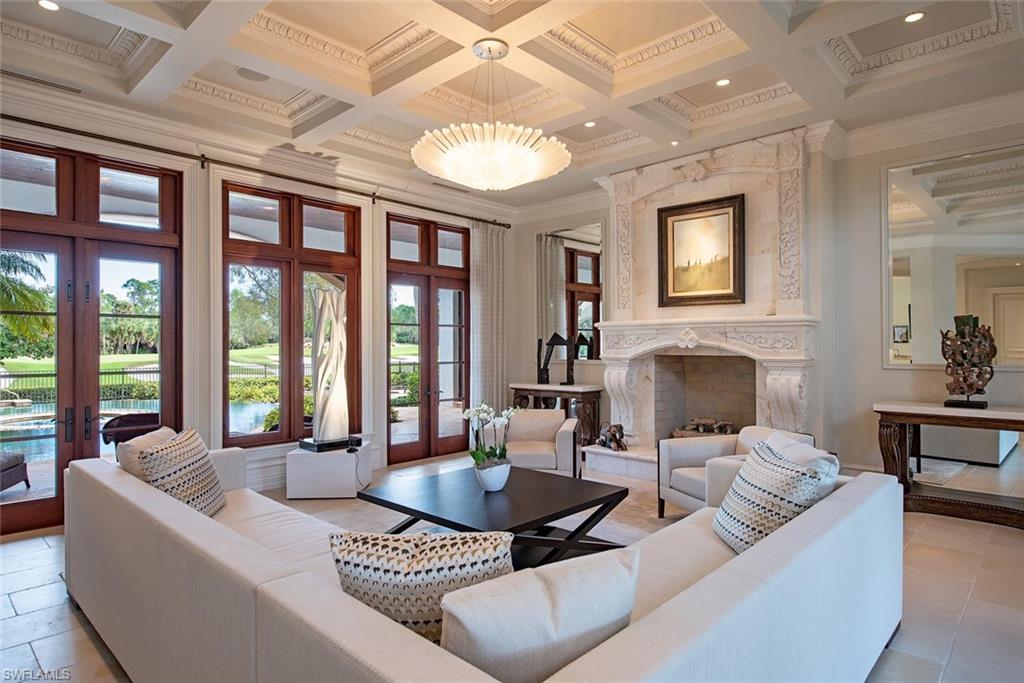 17016 Treviso Way Naples, FL 34110 - Photo 5 of 35 a living room with furniture and a large window