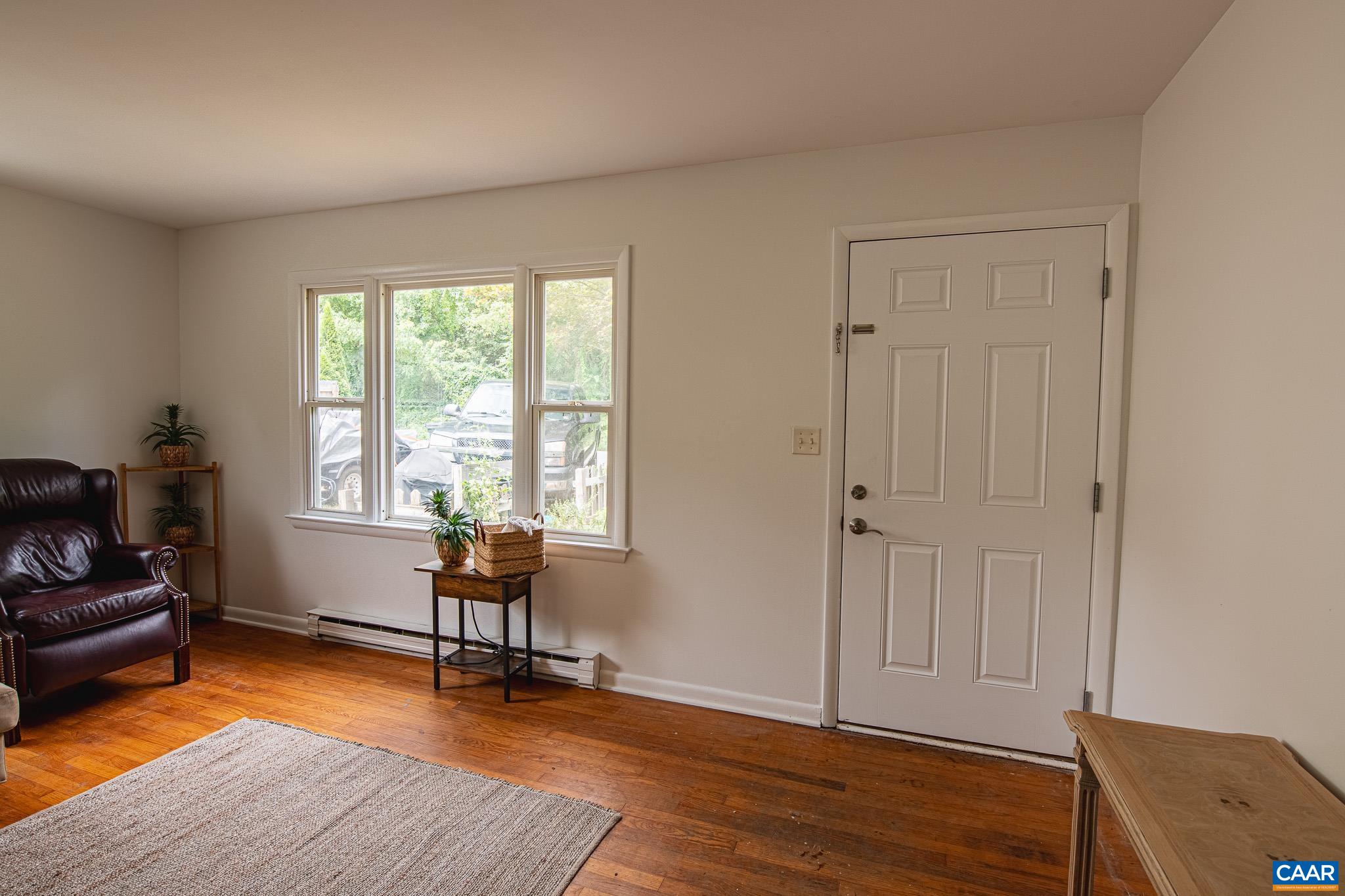 3019 Morgantown Road Ivy, VA 22903 - Photo 3 of 24 a living room with furniture and wooden floor