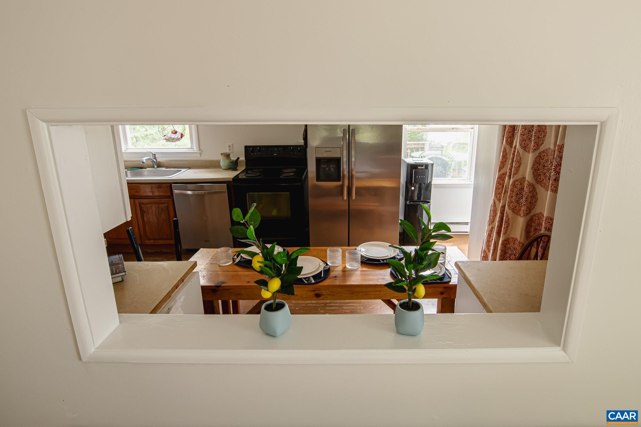 3019 Morgantown Road Ivy, VA 22903 - Photo 6 of 24 a dining room with furniture and a window