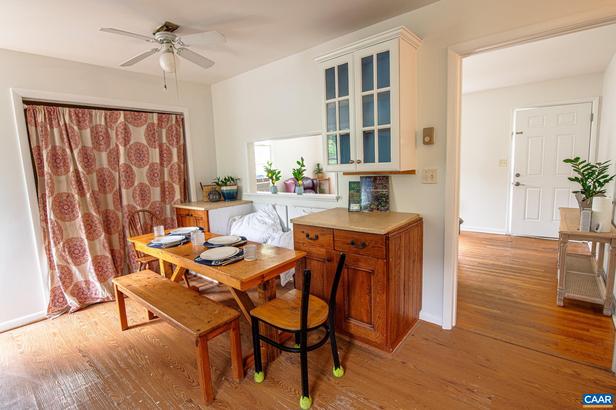 3019 Morgantown Road Ivy, VA 22903 - Photo 8 of 24 a dining room with furniture and wooden floor