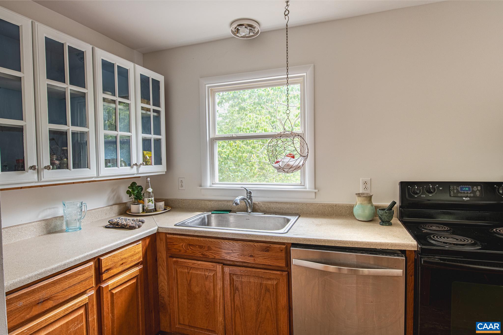 3019 Morgantown Road Ivy, VA 22903 - Photo 9 of 24 a kitchen with a sink and large window
